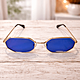 Occhiali da sole ottagonali con lenti blu